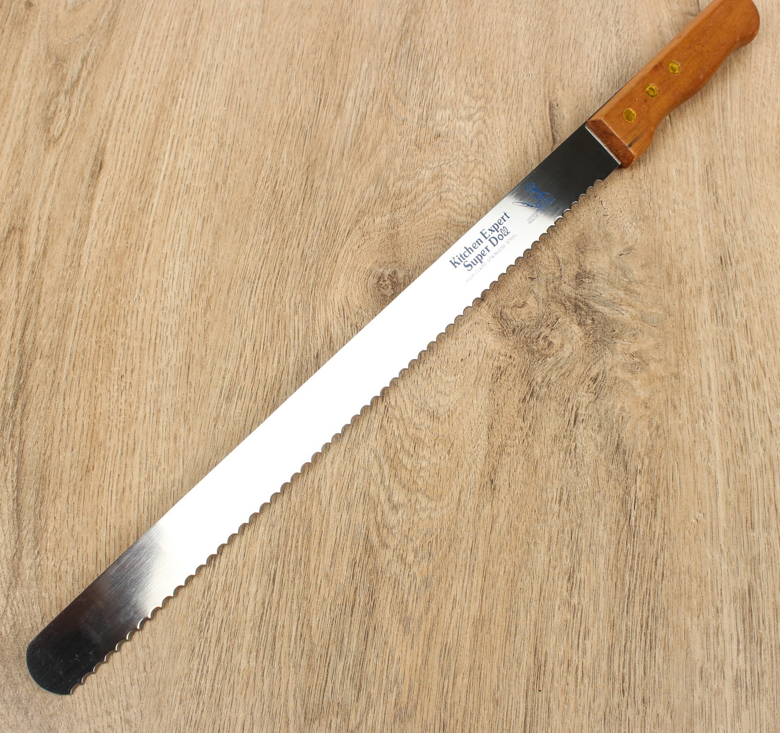 картинка Нож для нарезки бисквита КРУПНЫЕ зубцы 30 см (лезвие) ручка дерево от магазина KondiShop
